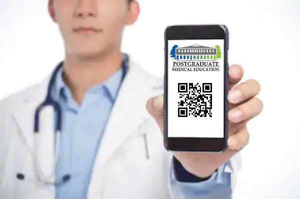 Doctor holding mobile phone with QR code on.